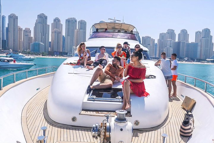 Sail along Dubai's stunning coastline aboard a luxurious yacht relishing refreshing drinks and delicious meals while taking in magnificent views of iconic landmarks. Enjoy sun-soaked moments with fellow travelers.